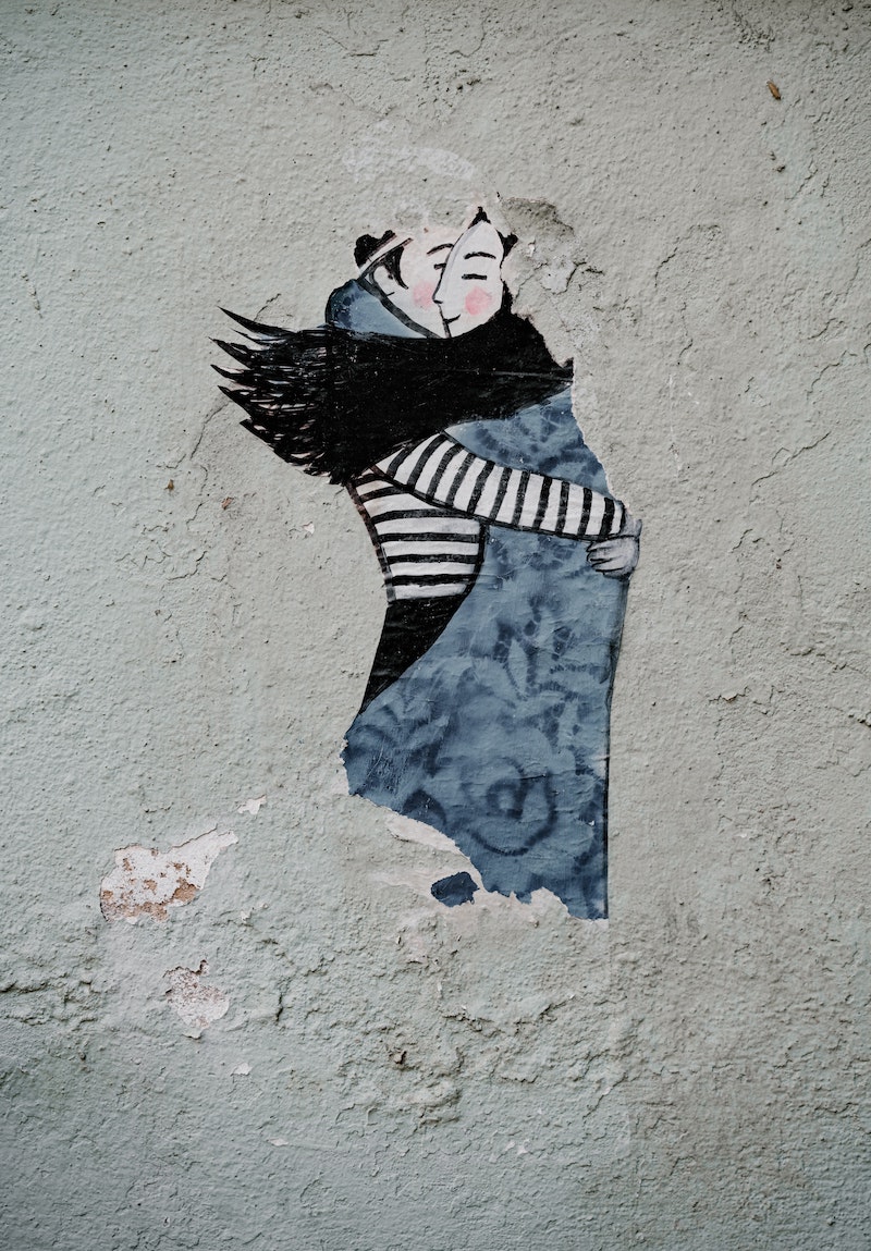 Mural of two bodies embracing - looking French!