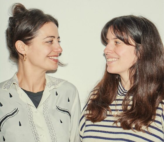 Side portrait of Forivor's Alice Ruby Ross and Rebecca Monserat photographed facing each other