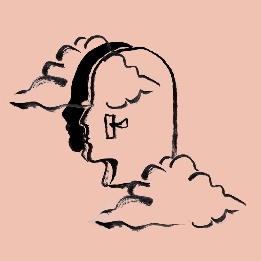 A profile head hand painted with a lock and key and clouds